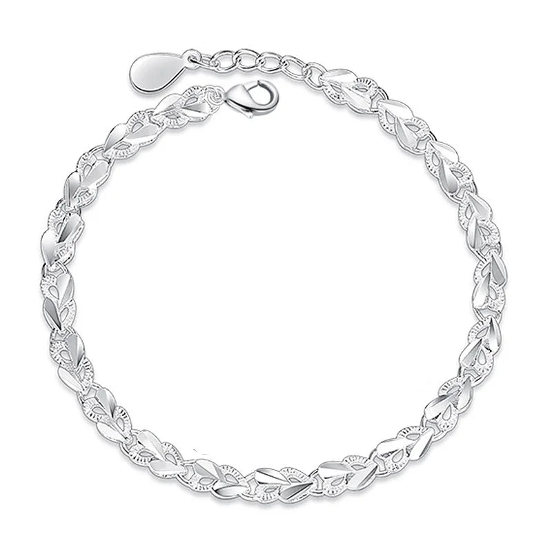 Pulsera de Encantos en Plata de Ley 925 con Diseño de Corazón